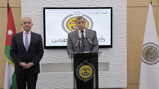 Minister of Health Saad Jaber announces the new coronavirus cases recorded in Jordan during a press briefing at the National Centre for Security and Crisis Management on Tuesday (Petra photo)
